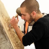 Second year sculpture student working in studio