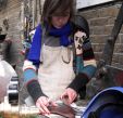 First year sculpture student working in metal workshop
