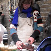 First year sculpture student working in metal workshop