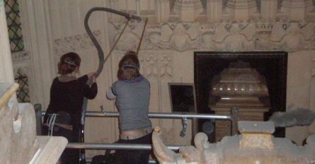 Lucy Ackland and Caroline Davies dusting architectural details