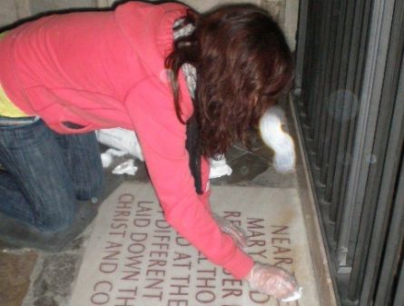 Jelena Bandur cleaning floor ledgers