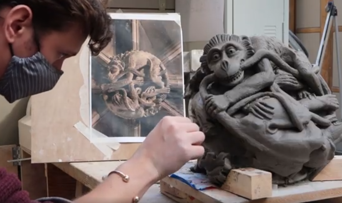 How can an Art School function during a global pandemic? - Stone Carving student working on a clay model